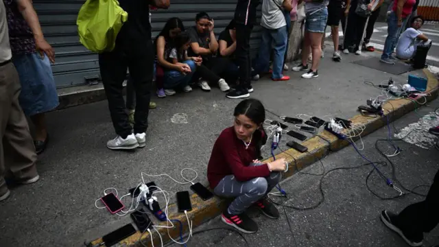 Venezuelans charging cell phones. 