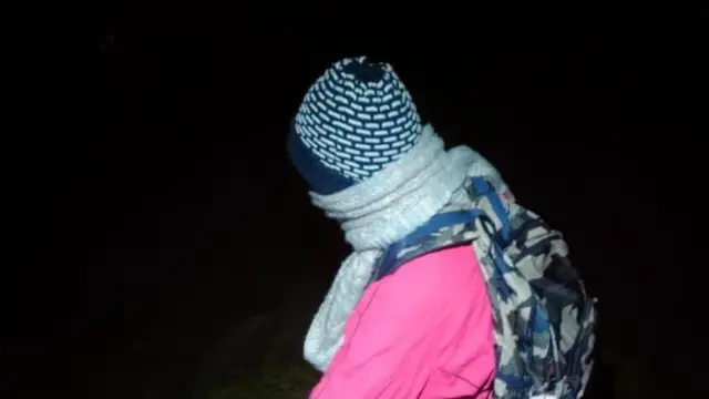 A migrant going towards a boat 