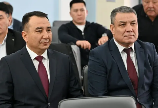 Райимберди Дүйшөнбиев (солдо) жана Жайлообай Нышанов