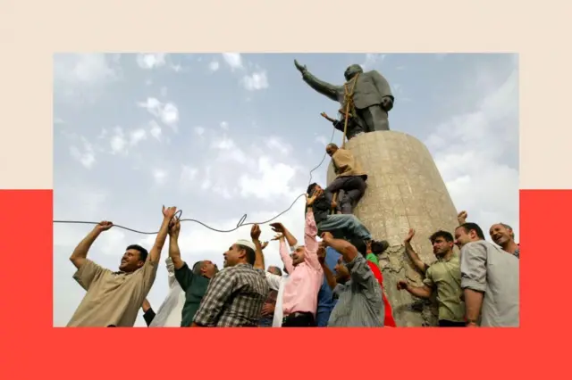 सद्दाम हुसैन की एक प्रतिमा को बग़दाद के केंद्र में गिरा दिया गया