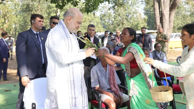 छत्तीसगढ़ में एक कार्यक्रम के दौरान गृह मंत्री अमित शाह 