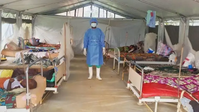 Dr Kitwanda don dey respond to outbreaks for ova 10 years and don help control Ebola outbreak for di region years ago.