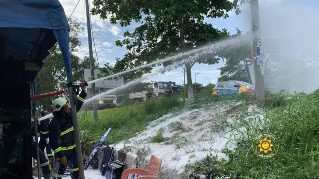 fire crew clearing bees at a location