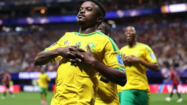 Teboho Mokoena of South Africa celebrate afta e score penalty for im team