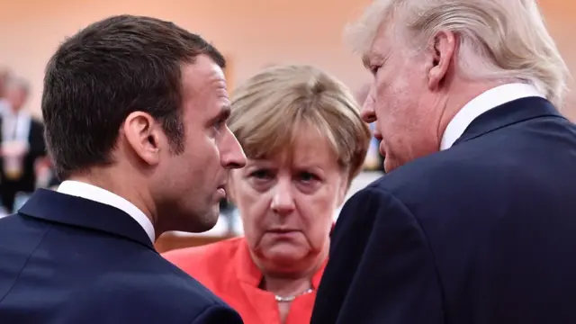 Angela Merkel pictured with Emmanuel Macron and Donald Trump at the 2017 G20 meeting in Hamburg