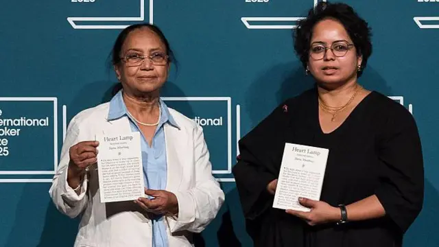 Banu Mushtaq (L) and Deepa Bhasthi, author and translator of 'Heart Lamp' shortlisted for the International Booker Prize 2025 take part in a photo-call ahead of a reading event at Southbank Centre in London, United Kingdom on May 18, 2025. 