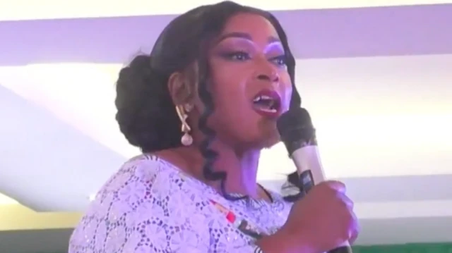 Woman speaking to mic