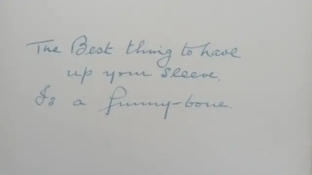 AN INSCRIPTION INSIDE A BOOK, reading 'The Best thing to have up your sleeve is a funny bone' and is dated to the 7th February 1944. 