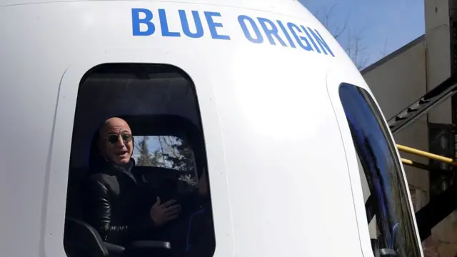 Amazon and Blue Origin founder Jeff Bezos addresses the media about the New Shepard rocket booster and Crew Capsule mockup at the 33rd Space Symposium in Colorado Springs, Colorado, United States April 5, 2017