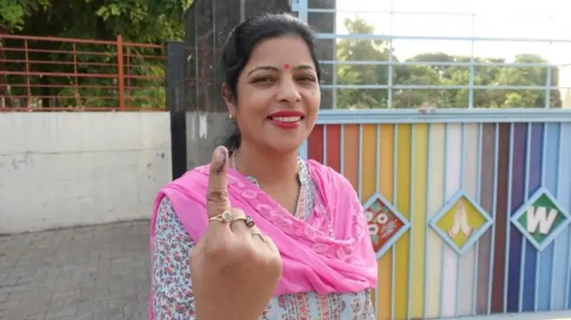 મહિલા મતદાતાની તસવીર 