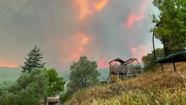 Jo Barnes and her family had a near miss when a wildfire near the town of Cotignac in southern France came within metres of her house. 