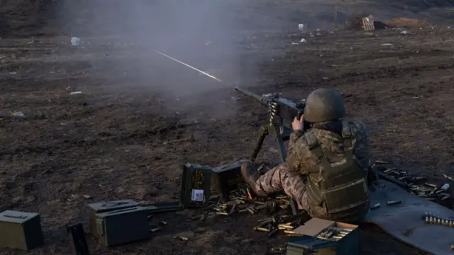  A recruit from the 80th Brigade during machine gun training on March 9,2023 near Bakhmout,Donetsk Region, Ukraine.