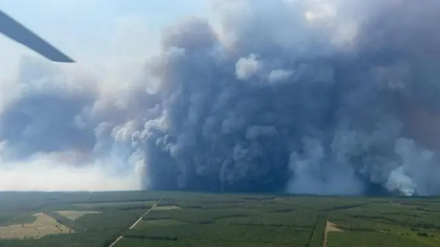 A pyrocumulonimbus cloud as seen over the village of Saumos, France, on Saturday 