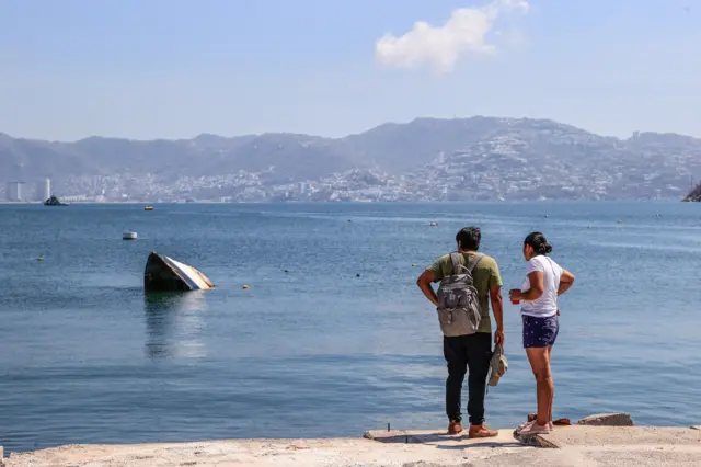 Um barco afundado após o furacão