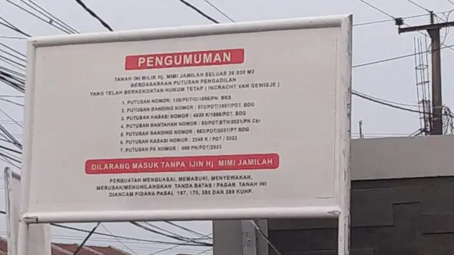 Papan plang eksekusi sita lahan di cluster setia mekar 2.