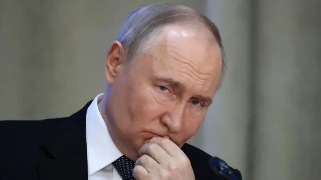 Путін