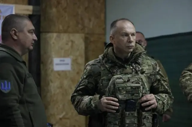 Сырский и еще три человека