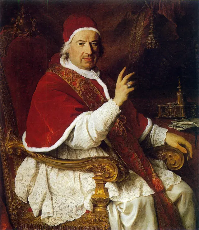 Camauro, gorro vermelho utilizado por papas. Na pintura, de 1745, está o papa Bento 14. Bento 16 foi o último papa a utilizar o adereço