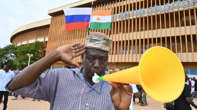 Thousands come out in support at a pro-coup rally at the national stadium