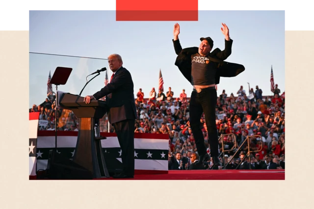 Elon Musk jumps in the air as Donald Trump gives a speech during his rally