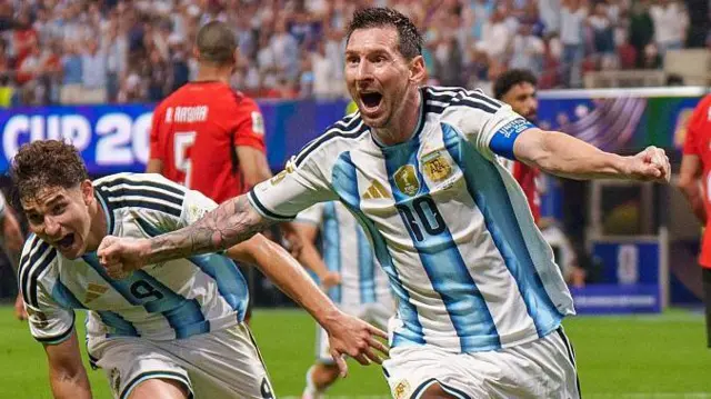 Lionel Messi, Julian Alvarez and Enzo Fernandez celebrate after a goal against Egypt