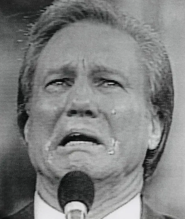 Dis na black and white screen photo of Swaggart 1988 broadcast, Im holds microphone dey cry