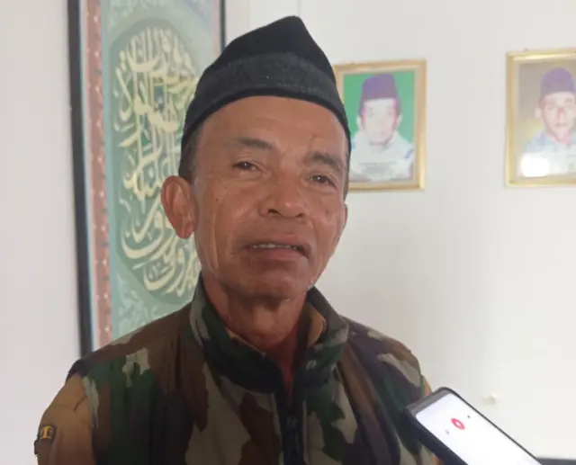 Kepala Desa Purwarahayu, Kecamatan Taraju, Kabupaten Tasikmalaya, Dede Ejen.