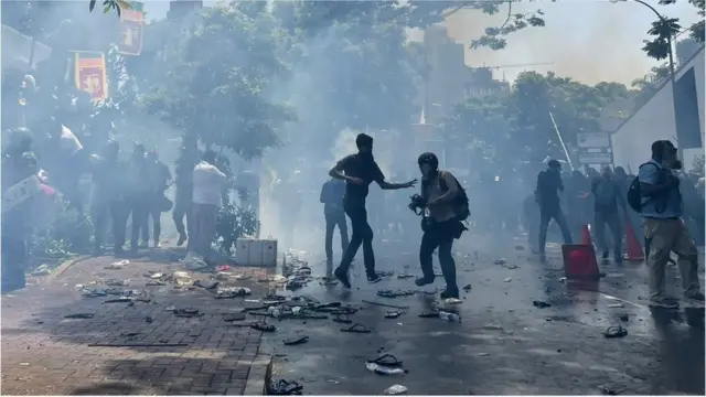 Police fire protesters tear gas