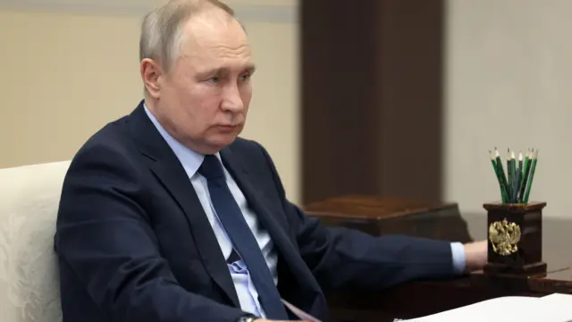 путін