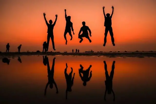 In Mumbai, India, people gathered to witness the final sunset of 2025, before ringing in 2026