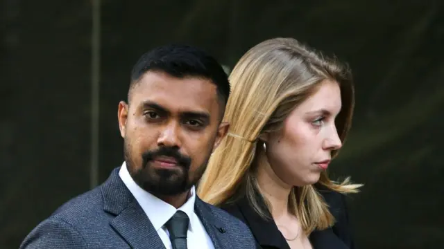 Gunathilaka arriving at courts hand in hand with a woman