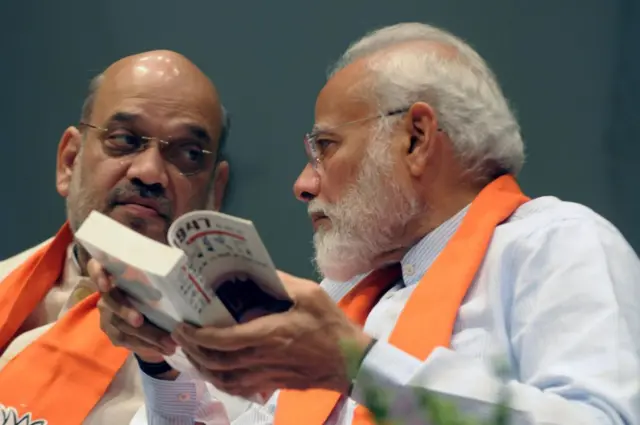 প্রধানমন্ত্রী মোদীর সঙ্গে স্বরাষ্ট্রমন্ত্রী অমিত শাহ (ফাইল ছবি)