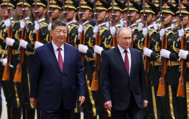 EPA // Russian President Vladimir Putin (R) and Chinese President Xi Jinping (L) inspect an honor guard during a welcoming ceremony at the Great Hall of the People in Beijing, China, 20 May 2026.
Russian President Vladimir Putin visits China, Beijing - 20 May 2026