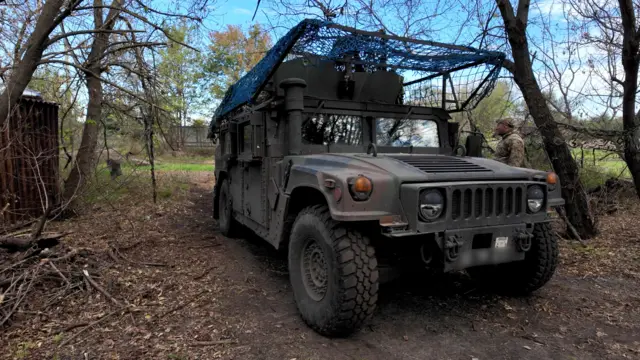 Hummer in forest