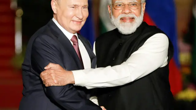 الرئيس الروسي بوتين مع رئيس الوزراء الهندي ناريندرا مودي