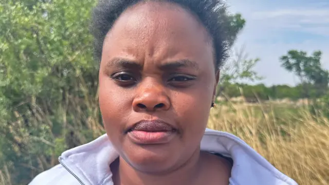 Close-up image of one young woman wey wear grey hoodie.