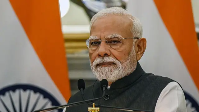 मोदी की तस्वीर