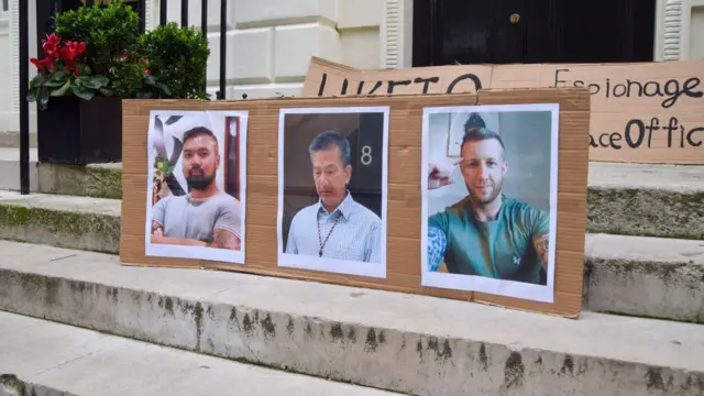 Hong Konglu eylemciler, hükümet adına ajanlık yapmakla suçlanan üç kişiye karşı protesto gösterisi yapmıştı.