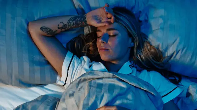 ਸੁੱਤੀ ਹੋਈ ਔਰਤ