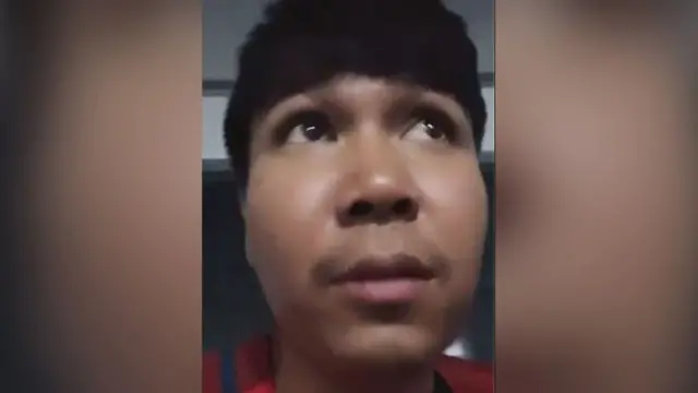 Udomporn Champahom filming himself in hiding