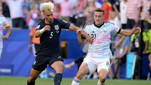 Antonee Robinson, with his distinctive blond hair, in action for the United States at the World Cup