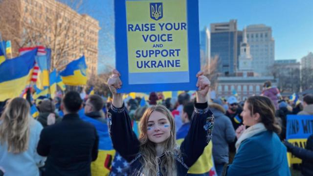 Olga participating a rally in support of Ukraine