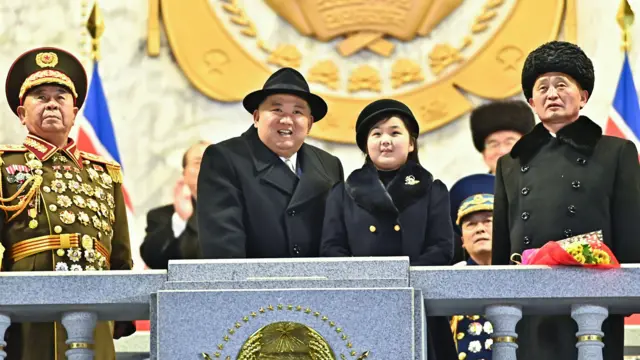 Kim Jong Un and Kim Ju Ae viewing a military parade at Kim Il Sung Square to mark the 75th anniversary of the founding of the Korean People's Army (KPA), February 2023 