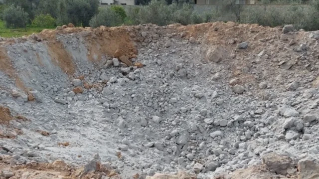 ইসরায়েলি বিমান হামলার পর আহমেদ আবুইবাইদ সেখানকার একটি ছবি তোলেন