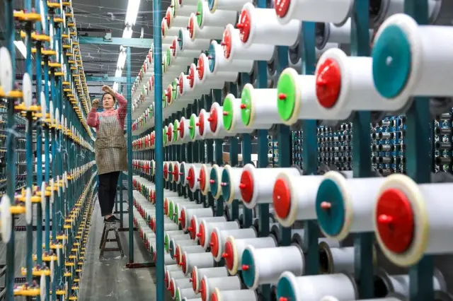 Textile workers are exposed to higher levels of microplastic pollution than many, which may come with health risks (Credit: Getty Images)