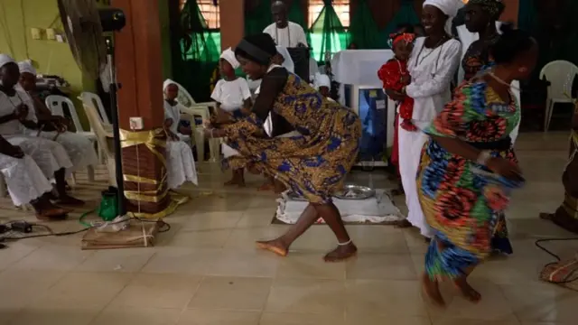 African Traditional Religion worshippers dance for dia shrine during worship