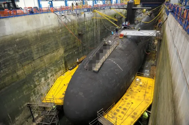 A picture taken on December 5, 2016 shows a nuclear submarine at the naval base in Ile Longue, western of France.