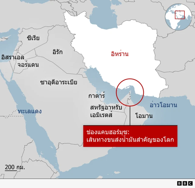 A BBC map showing the Strait of Hormuz, off the south coast of Iran. Surrounding countries are grey. Please put your translation of all words in here for people who are sight impaired.