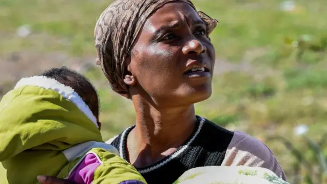 Sub-Saharan migrants camp out in front of the Ivory Coast embassy for Tunis on February 28, 2023
