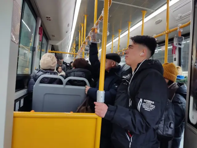 Коомдук транспорттун ичи